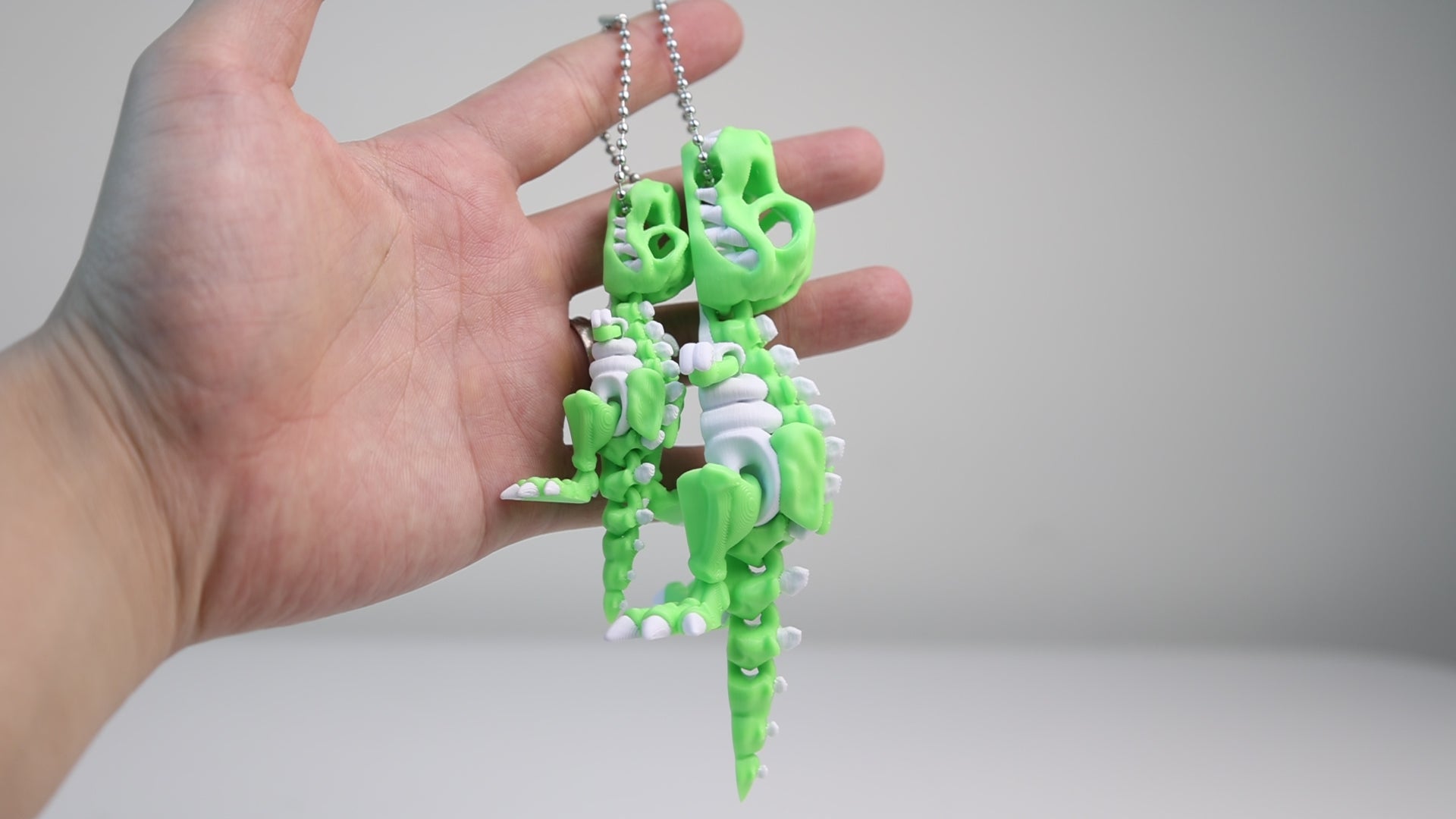 Load video: [Set of 2] Tyrannosaurus Dinosaur Keychain - Fully Poseable