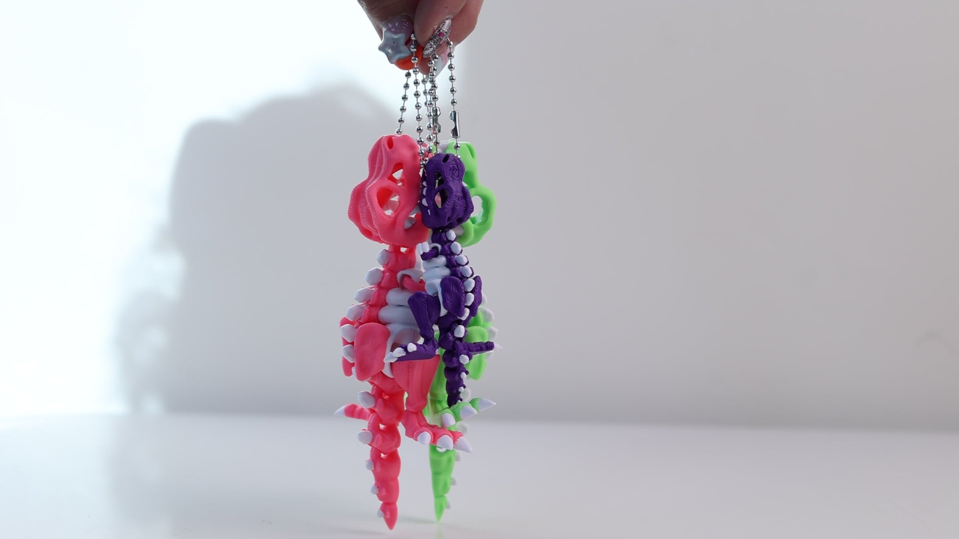 Load video: [Set of 2] Tyrannosaurus Dinosaur Keychain - Fully Poseable